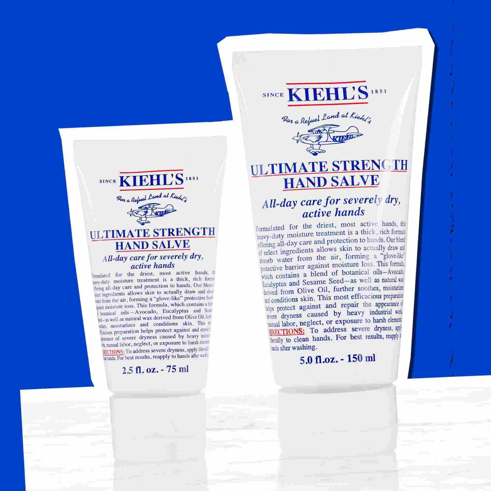 Due tubetti di Kiehl's Ultimate Strength Hand Salve che illustrano i formati disponibili