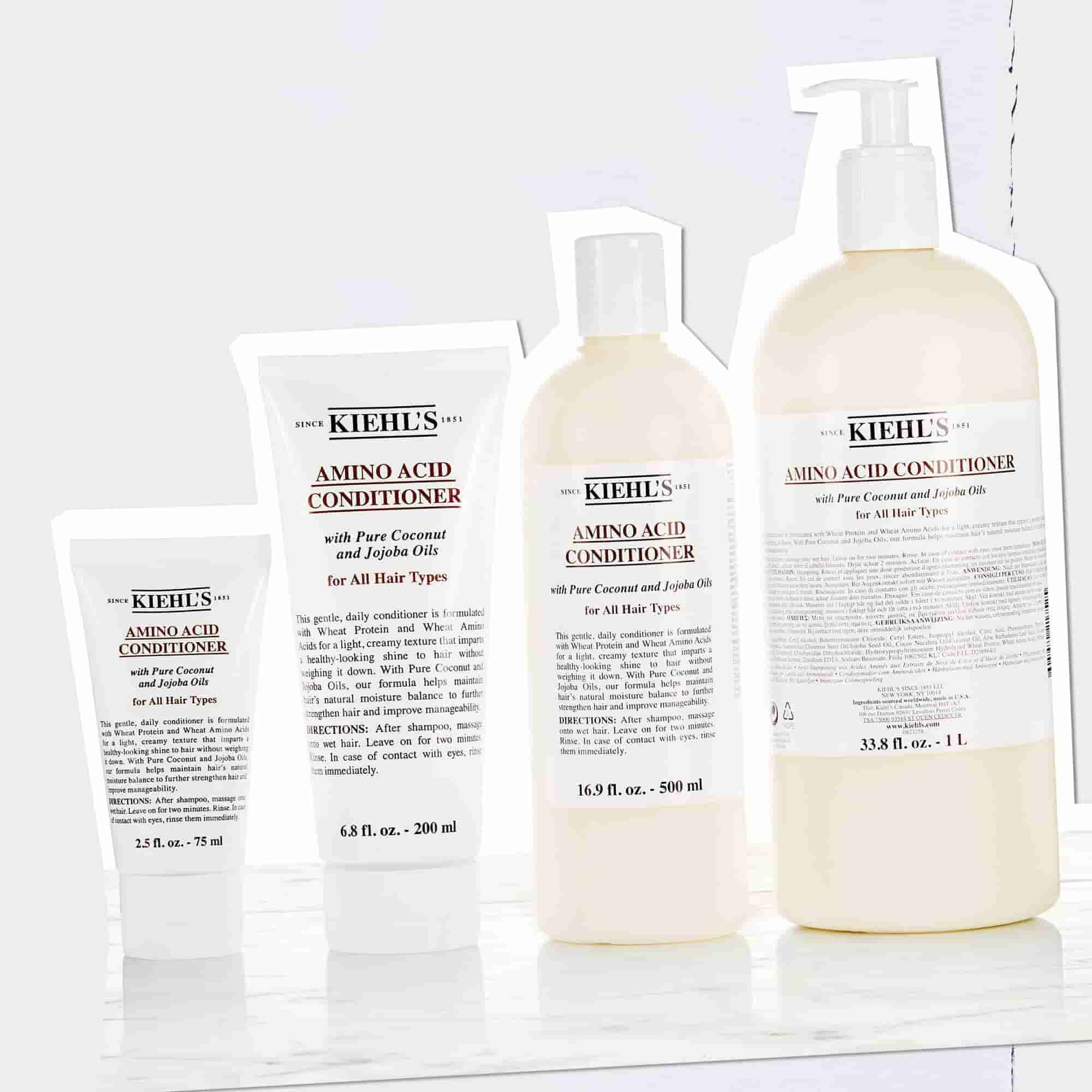 Bottiglie di Balsamo per Amminoacidi Kiehl's in dimensioni da 2,5 fl. oz. – 75 ml a 33,8 fl. oz. – 1 L